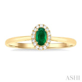 5x3 MM Oval Shape Emerald and 1/20 Ctw Single Cut Diamond Halo Precious Ring in 10K Yellow Gold
